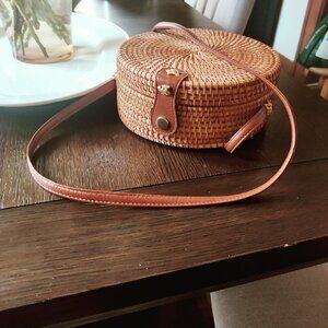 Purse of woven charm in a rich chestnut brown for over the shoulder
